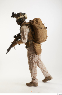Casey Schneider Paratrooper in Desert Marpat with Gun standing walking…